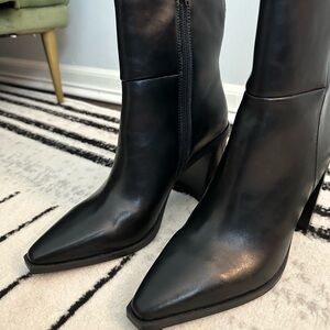 Brand new Steve Madden leather boots.